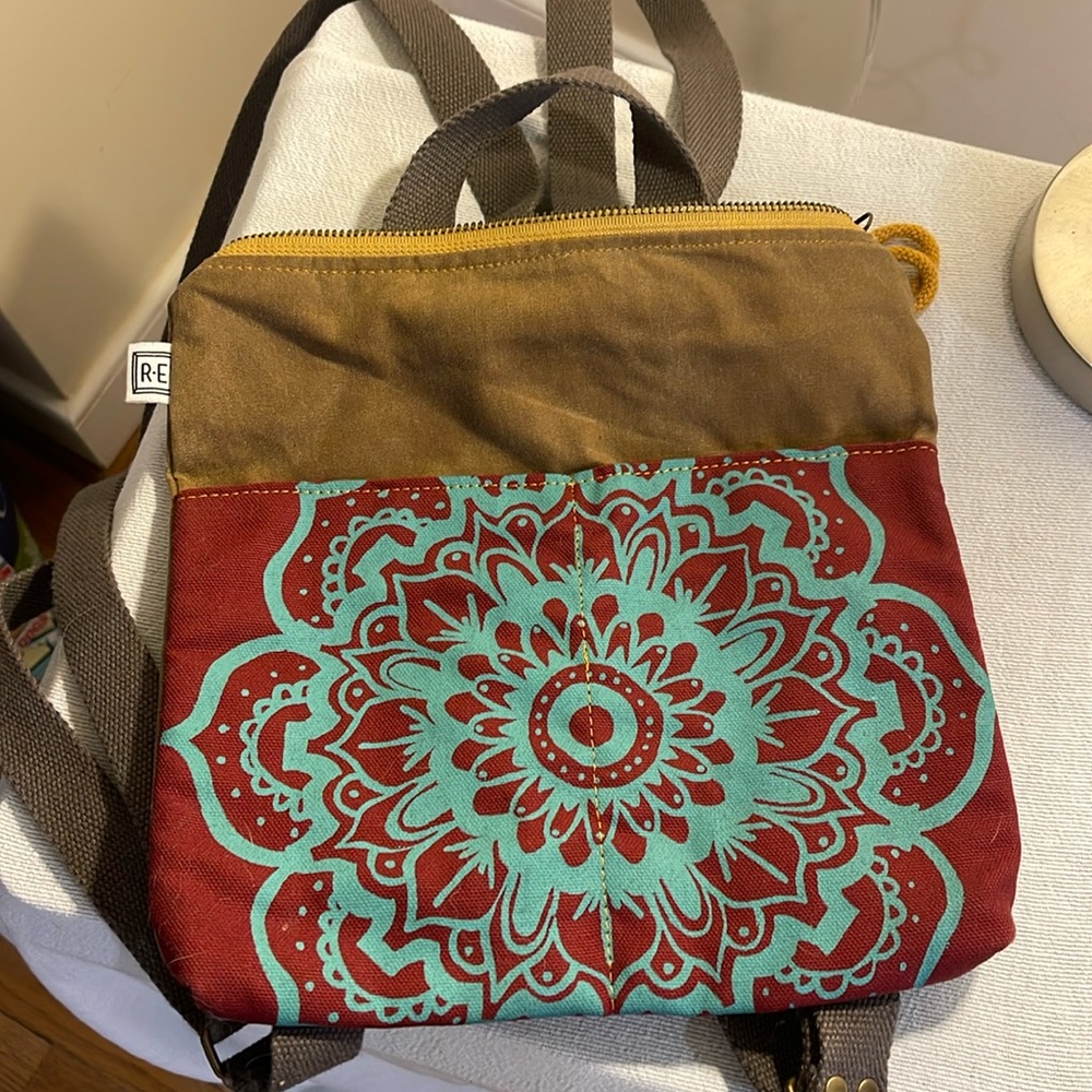 Rachel Elisa mini back pack. Waxed canvas, moss brown with burgundy and teal.